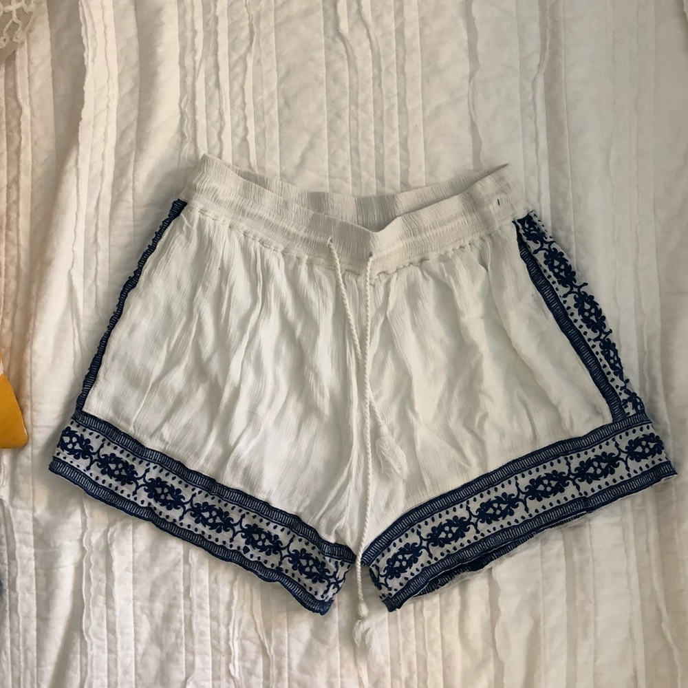 White shorts with blue embroidery!